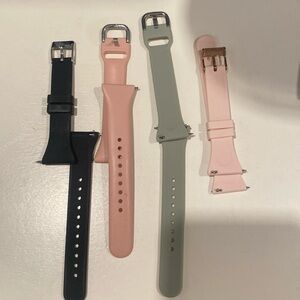 Fitbit watch bands all size small perfect condition . And working charger.